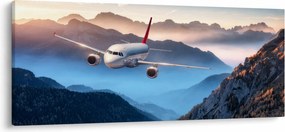 Tablou - Avion peste crestele montane (120x50 cm)