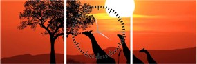 Tablou cu girafe în apus de soare (cu ceas) (90x30 cm)