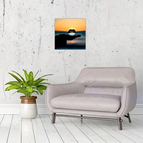 Tabloul cu bilă din sticlă în palmă (30x30 cm)