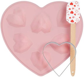 Un set de accesorii pentru copt cu motiv de inimă