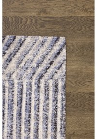 Covor albastru deschis din lână 200x300 cm Strokes – Agnella