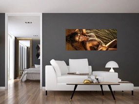 Tablou cu femeia întinsă pe plajă (120x50 cm)