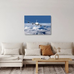 Tablou pe sticlă - Avion în nori (70x50 cm)
