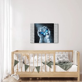 Tablou cu flutere albastru pe perete (70x50 cm)