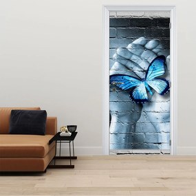 Fototapet pentru ușă - Fluture albastru pe perete (95x205cm)