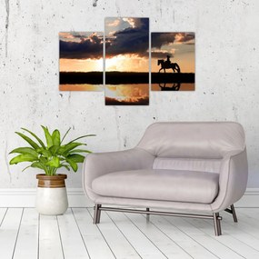 Tablou - Rider pe un cal la apus de soare (90x60 cm)