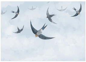 Fototapet - Adunare de rândunele - păsări în zbor pe cer albastru și noros