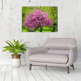 Tablou pe sticlă cu pom înflorit pe luncă (70x50 cm)