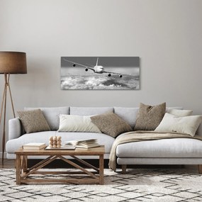 Tablou - Avion în nori, alb și negru (120x50 cm)