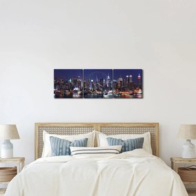 Tablou - Zgârie-nori din New York iluminate (cu ceas) (90x30 cm)