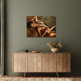 Tablou cu femeia întinsă pe plajă (70x50 cm)