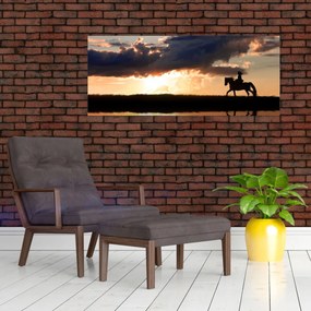 Tablou - Rider pe un cal la apus de soare (120x50 cm)