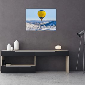 Tablou pe sticlă - Zbor peste peisaj de iarnă (70x50 cm)