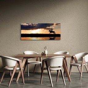 Tablou - Rider pe un cal la apus de soare (120x50 cm)