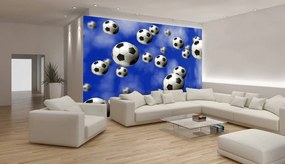 Fototapet - Mingi de fodbal pe fundal albastru (152,5x104 cm)