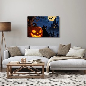 Tablou - Pisică neagră lângă un dovleac luminat de Halloween (90x60 cm)
