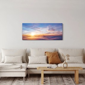 Tablou - Apus de soare deasupra norilor (120x50 cm)