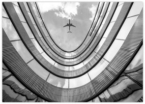 Tablou pe sticlă - Avionul deasupra clădirii (70x50 cm)