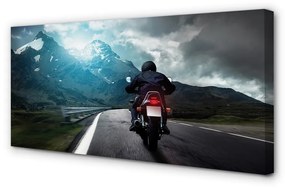 Tablouri canvas Motociclete de munte om rutier cer