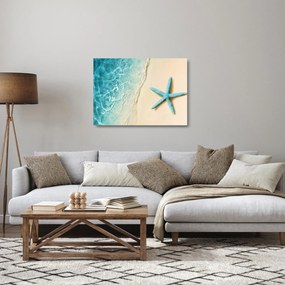 Tablou pe sticlă - Stea de mare pe plajă (70x50 cm)