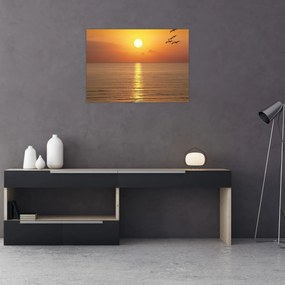 Tablou pe sticlă - Apus de soare peste ocean (70x50 cm)