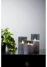 Lumânare de ceară cu LED-uri gri în sticlă Star Trading M-Twinkle, înălțime 15 cm