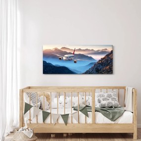 Tablou - Avion peste crestele montane (120x50 cm)