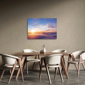Tablou pe sticlă - Apus de soare deasupra norilor (70x50 cm)