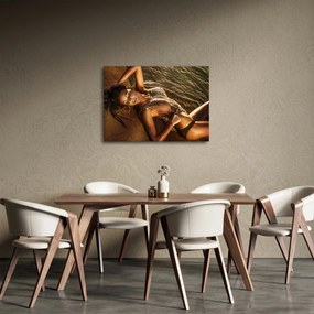 Tablou cu femeia întinsă pe plajă (70x50 cm)