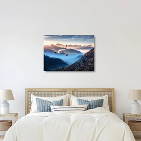 Tablou pe sticlă - Avion peste crestele montane (70x50 cm)