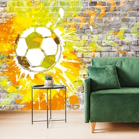 Tapet minge de fotbal pe zid de cărămidă