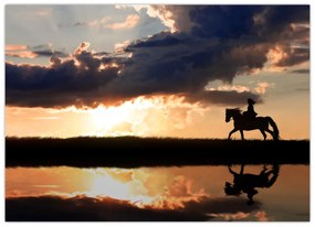 Tablou - Rider pe un cal la apus de soare (70x50 cm)