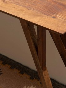 Masă consolă eclectică din lemn de acacia, maro, cu blat teșit și picioare oblice prinse în triunghi, 76 x 133 x 41 cm, „Avila”