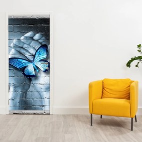 Fototapet pentru ușă - Fluture albastru pe perete (95x205cm)