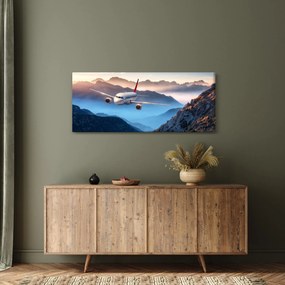Tablou - Avion peste crestele montane (120x50 cm)