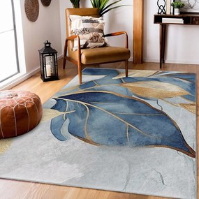 Covor albastru/auriu lavabil 120x180 cm Golden Leaves – Mila Home
