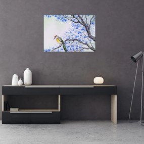 Tablou pe sticlă - Pasăre pe un copac cu flori albastre (70x50 cm)