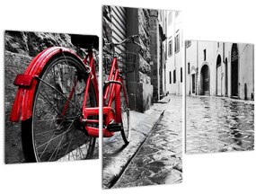 Tablou - Bicicleta roșie pe o stradă pavată (90x60 cm)