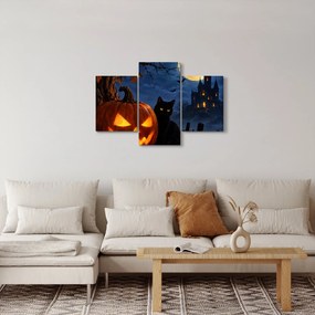 Tablou - Pisică neagră lângă un dovleac luminat de Halloween (90x60 cm)