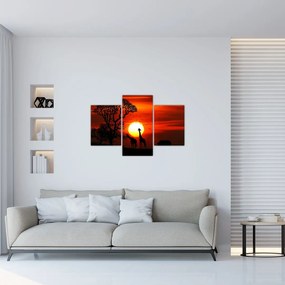 Tablou - Siluete animalelor la apus de soare (90x60 cm)