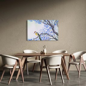 Tablou - Pasăre pe un copac cu flori albastre (90x60 cm)