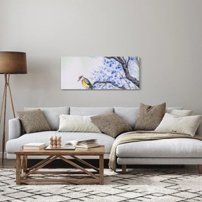 Tablou - Pasăre pe un copac cu flori albastre (120x50 cm)