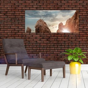 Tablou - Apus de soare peste stânci (120x50 cm)