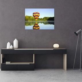 Tablou pe sticlă cu balon cu aer cald pe un lac (70x50 cm)