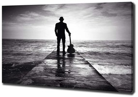 Tablou pe pânză canvas Chitarist pe dig