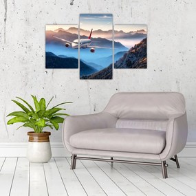 Tablou - Avion peste crestele montane (90x60 cm)