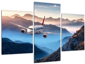 Tablou - Avion peste crestele montane (90x60 cm)