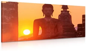 Tablou statuia lui Budha printre pietre