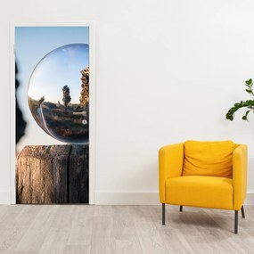 Fototapet pentru ușă - Peisaj și lupă (95x205cm)
