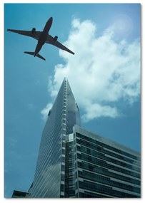 Tablou Printat Pe Sticlă Avionul deasupra orașului
